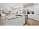 Spacious kitchen with granite countertops, stainless steel appliances, kitchen island and opens up to the living area at 602 Jancus St, Charleston, SC 29414