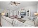 Inviting living room showcasing a large sectional sofa, entertainment center, and stylish decor in a cozy setting at 602 Jancus St, Charleston, SC 29414