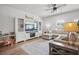 Comfortable living room with a plush sectional sofa, elegant entertainment center, and a stylish area rug at 602 Jancus St, Charleston, SC 29414