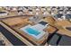 Aerial view of the fenced community pool and clubhouse, offering a refreshing retreat for residents to relax and socialize at 624 Sienna Way, Summerville, SC 29486