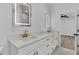Bathroom featuring double vanity, marble countertops, sleek gold faucets, and light-up mirrors at 6513 Highway 162, Hollywood, SC 29449