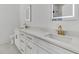 Bathroom featuring double vanity, marble countertops, sleek gold faucets, and light-up mirrors at 6513 Highway 162, Hollywood, SC 29449