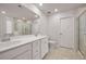 Bright bathroom featuring a double vanity and glass-enclosed shower at 701 Squire Pope Rd, Summerville, SC 29486