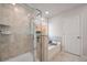 Well-lit bathroom with a soaking tub, separate shower, and modern fixtures at 701 Squire Pope Rd, Summerville, SC 29486