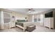 Comfortable bedroom with natural light, neutral decor, and ample storage at 701 Squire Pope Rd, Summerville, SC 29486
