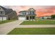 Charming two-story home with a two car garage, well-manicured lawn, and craftsman-style details at 701 Squire Pope Rd, Summerville, SC 29486