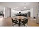 Spacious living area featuring a round table, modern kitchen and stainless appliances at 701 Squire Pope Rd, Summerville, SC 29486