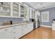 Bright kitchen with stainless steel appliances, quartz countertops, and modern cabinetry at 7021 Schooner St, Charleston, SC 29492