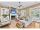 Cozy living room with fireplace, custom built-ins, and neutral-toned decor at 7021 Schooner St, Charleston, SC 29492