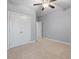 Bedroom featuring plush carpet, neutral walls, ceiling fan, and a double closet at 705 Quintan St, Summerville, SC 29486