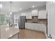Bright eat-in kitchen featuring stainless steel appliances and plenty of countertop space at 705 Quintan St, Summerville, SC 29486