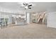 Spacious living room showcases an open layout with seamless flow to the kitchen, dining area, and staircase at 705 Quintan St, Summerville, SC 29486