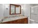 Bathroom with a vanity, mirror, and walk-in shower at 712 Wakendaw Blvd, Mount Pleasant, SC 29464