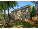Charming two-story brick home with blue shutters and mature trees at 712 Wakendaw Blvd, Mount Pleasant, SC 29464