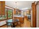 Charming kitchen featuring wood cabinets, hardwood floors, and a cozy breakfast nook area at 712 Wakendaw Blvd, Mount Pleasant, SC 29464