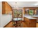 Charming eat-in kitchen with custom cabinets, quartz counters, and window view at 712 Wakendaw Blvd, Mount Pleasant, SC 29464