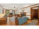 Inviting living room with hardwood floors, fireplace, and multiple windows at 712 Wakendaw Blvd, Mount Pleasant, SC 29464