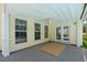 Cozy covered back patio with a ceiling fan and a view of the backyard at 7511 Hawks Cir, Hanahan, SC 29410