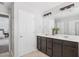 Well-lit bathroom with a double vanity and plenty of storage at 7511 Hawks Cir, Hanahan, SC 29410