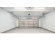 Clean, organized garage featuring plenty of space for storage and parking at 7511 Hawks Cir, Hanahan, SC 29410