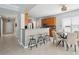 Bright kitchen features a breakfast bar, modern appliances, and a cozy dining area at 7511 Hawks Cir, Hanahan, SC 29410