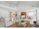Open-concept living area showcasing a seamless blend of kitchen, dining, and lounge spaces at 7511 Hawks Cir, Hanahan, SC 29410