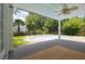 Inviting outdoor pool and seating area with palm trees, ideal for relaxation and entertainment at 7511 Hawks Cir, Hanahan, SC 29410