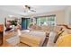 Bright living room with a comfortable sectional sofa, wood floors, and lots of natural light at 774 Creekside Dr, James Island, SC 29412