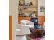 Wet bar featuring open shelving, a beverage cooler, and stylish decor in the seating area at 774 Creekside Dr, James Island, SC 29412