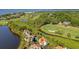 Stunning aerial view of a charming home, golf course, and scenic surroundings with ocean view at 930 Sealoft Villa Dr, Seabrook Island, SC 29455
