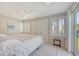 Bright bedroom with private balcony, white shutters, and ample closet space at 930 Sealoft Villa Dr, Seabrook Island, SC 29455