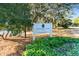 Entrance sign to Seabrook Island Racquet Club surrounded by lush foliage and trees at 930 Sealoft Villa Dr, Seabrook Island, SC 29455
