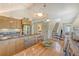 Bright dining area adjacent to the kitchen with a large wooden table and seating for six at 930 Sealoft Villa Dr, Seabrook Island, SC 29455