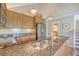Bright kitchen with stainless appliances, granite counters, and wood cabinets at 930 Sealoft Villa Dr, Seabrook Island, SC 29455