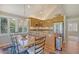 Well-lit kitchen with stainless steel appliances and spacious granite countertops at 930 Sealoft Villa Dr, Seabrook Island, SC 29455