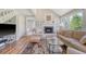 Inviting living room featuring fireplace, plush seating, and natural light at 930 Sealoft Villa Dr, Seabrook Island, SC 29455