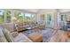 Cozy living room featuring comfortable seating, large windows with picturesque views, and stylish décor at 930 Sealoft Villa Dr, Seabrook Island, SC 29455
