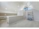 Cozy loft area featuring vaulted ceilings, recessed lighting, and neutral color palette at 930 Sealoft Villa Dr, Seabrook Island, SC 29455