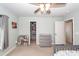 Bright Bedroom with carpet, ceiling fan, and closet at 9836 Black Tupelo Ln, Ladson, SC 29456