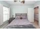 Bedroom with carpet, large windows, and ceiling fan at 9836 Black Tupelo Ln, Ladson, SC 29456