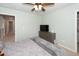 Bedroom with carpet, ceiling fan, and access to bath at 9836 Black Tupelo Ln, Ladson, SC 29456