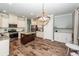 Well-equipped kitchen with stainless steel appliances, granite countertops, and ample cabinet space at 9836 Black Tupelo Ln, Ladson, SC 29456