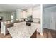 Bright kitchen with granite countertops, stainless steel appliances, and ample counter space at 9836 Black Tupelo Ln, Ladson, SC 29456