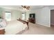 Spacious main bedroom with a ceiling fan, a large dresser, and natural light at 9836 Black Tupelo Ln, Ladson, SC 29456