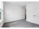 Clean bedroom with neutral carpet, a bright window, and white trim at 1023 Marsh Harrier Dr # Cc3-3-5P, Ravenel, SC 29470