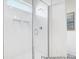 Bright, tiled shower showcasing built-in shelves and a glass door at 1023 Marsh Harrier Dr # Cc3-3-5P, Ravenel, SC 29470