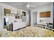 Well decorated and brightly lit bedroom with hardwood floors and white trim at 1032 Windward Rd, Charleston, SC 29412