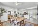 Bright dining room with hardwood floors and an arched doorway at 1032 Windward Rd, Charleston, SC 29412
