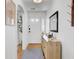 Bright entryway featuring hardwood floors and decorative accents at 1032 Windward Rd, Charleston, SC 29412