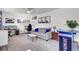 Carpeted living room with gray couch, white walls, and a ceiling fan at 1032 Windward Rd, Charleston, SC 29412